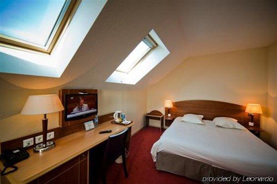 Отель Ibis Styles Clermont-Ferrand Aeroport Номер фото
